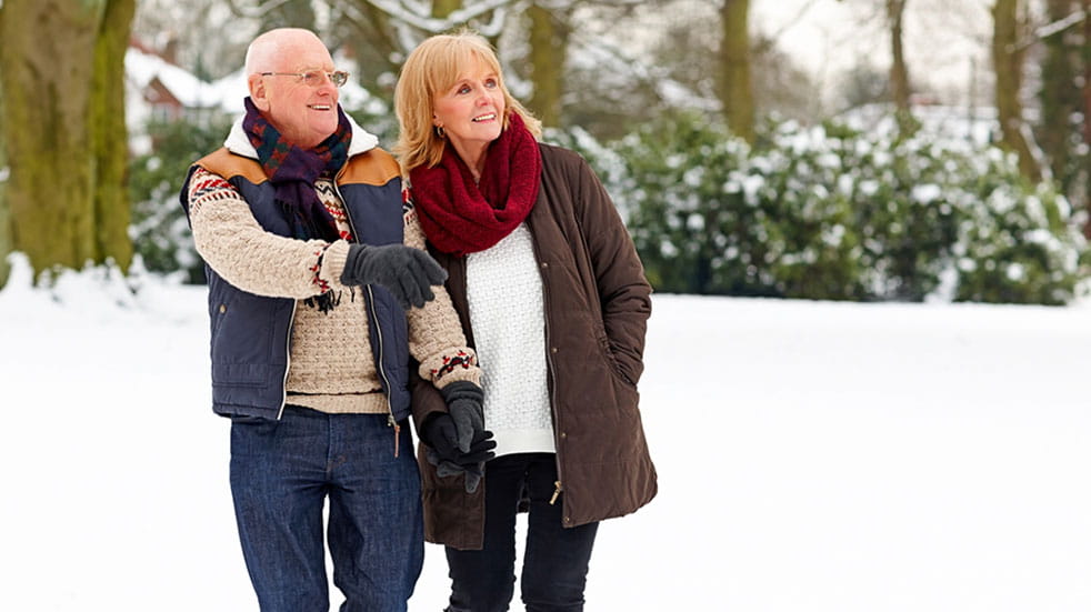 Claudia Hammond Christmas wellbeing tips man and woman walking snow